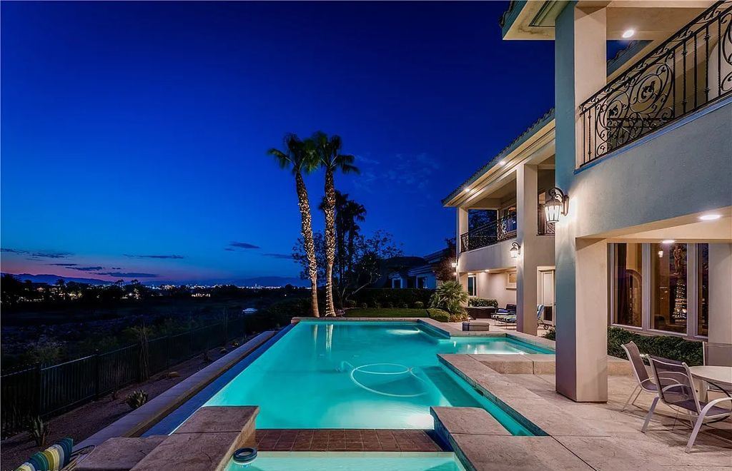 The Home in Henderson, an elegant Terracina estate with classic finishes in a prestigious guard-gated community offers panoramic mountain, sprawling golf course, city, and Strip views is now available for sale. This home located at 2608 Ragusa Ct, Henderson, Nevada