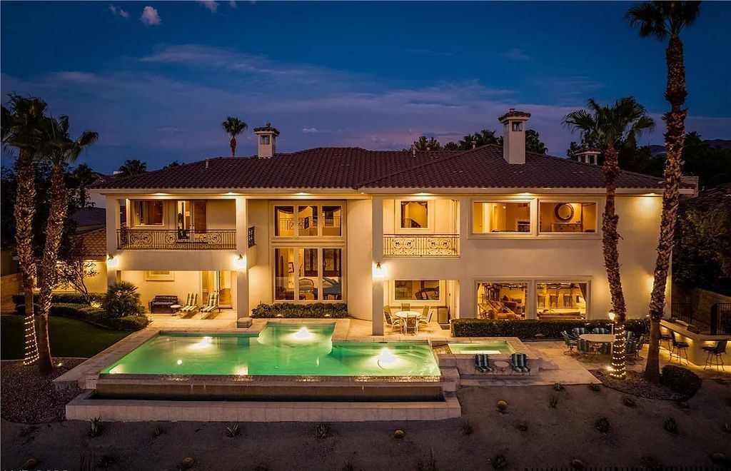The Home in Henderson, an elegant Terracina estate with classic finishes in a prestigious guard-gated community offers panoramic mountain, sprawling golf course, city, and Strip views is now available for sale. This home located at 2608 Ragusa Ct, Henderson, Nevada