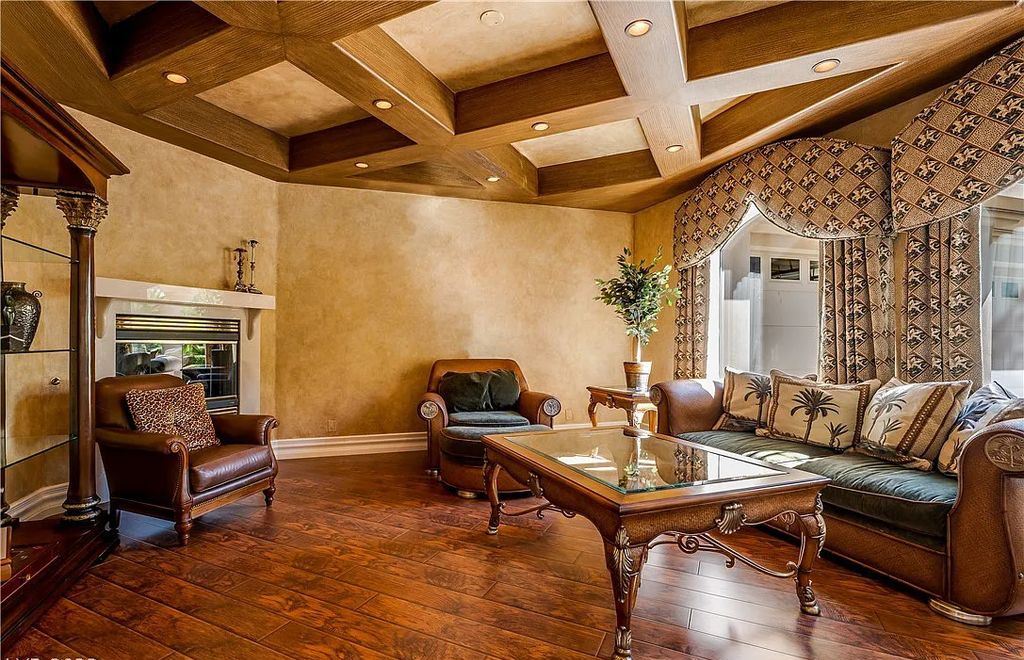 The Home in Henderson, an elegant Terracina estate with classic finishes in a prestigious guard-gated community offers panoramic mountain, sprawling golf course, city, and Strip views is now available for sale. This home located at 2608 Ragusa Ct, Henderson, Nevada
