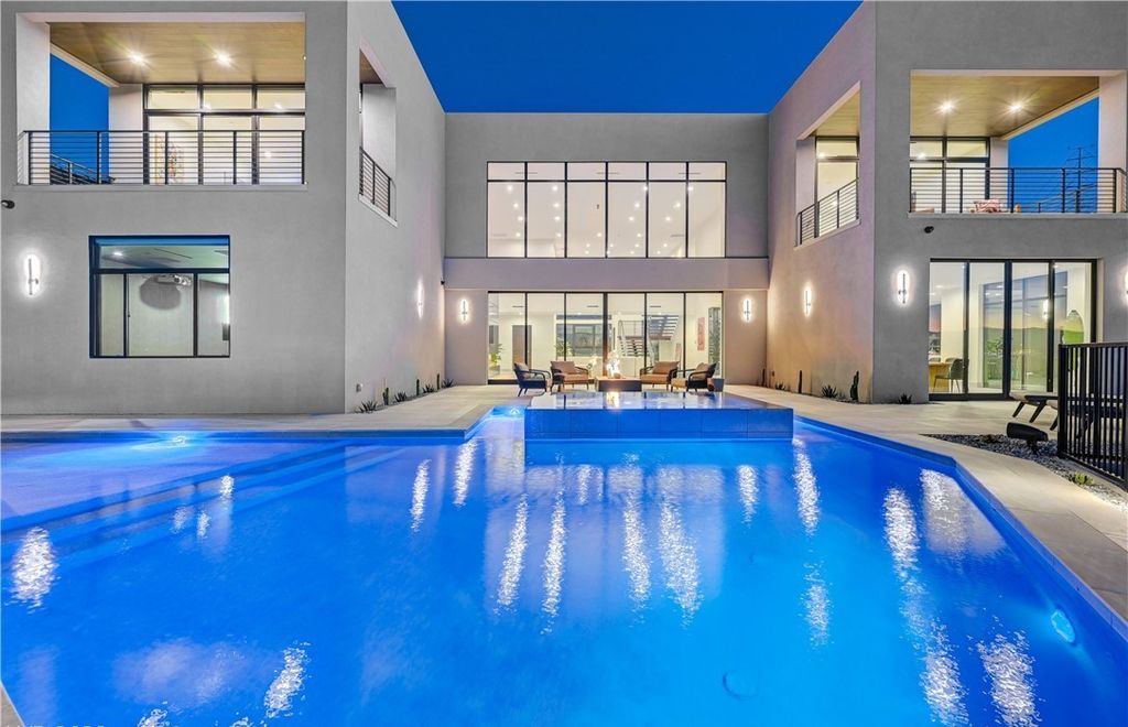 The Home in Henderson, a brand new construction features an open floor plan with modern finishes boasting unobstructed Vegas Strip and mountain views is now available for sale. This home located at 2281 Laughing Water Way, Henderson, Nevada