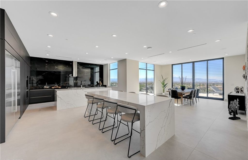 The Home in Henderson, a brand new construction features an open floor plan with modern finishes boasting unobstructed Vegas Strip and mountain views is now available for sale. This home located at 2281 Laughing Water Way, Henderson, Nevada