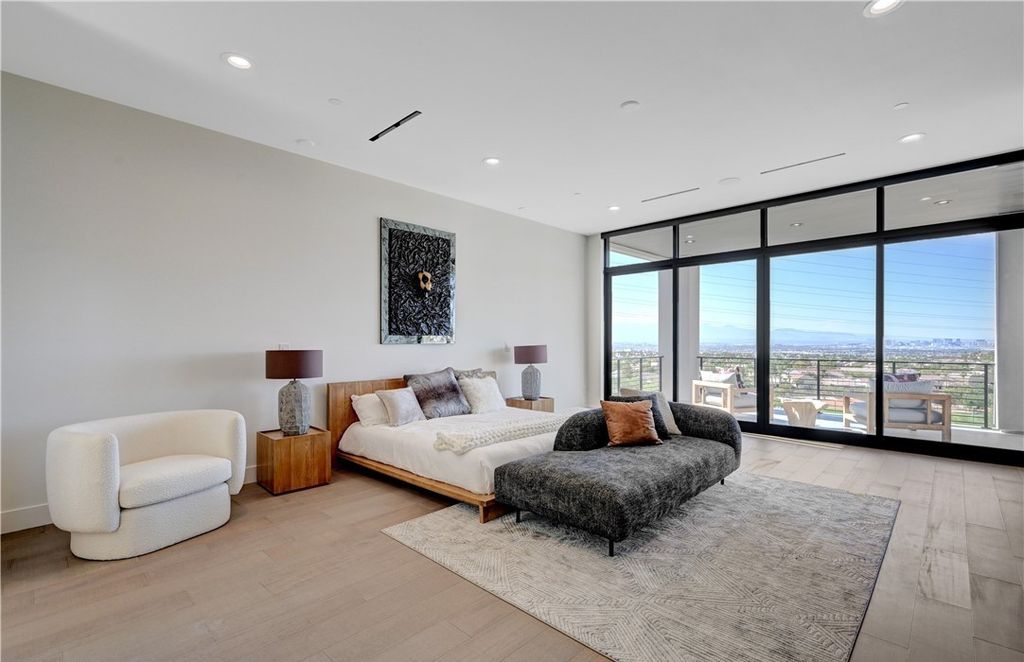 The Home in Henderson, a brand new construction features an open floor plan with modern finishes boasting unobstructed Vegas Strip and mountain views is now available for sale. This home located at 2281 Laughing Water Way, Henderson, Nevada