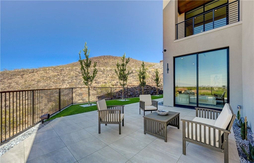 The Home in Henderson, a brand new construction features an open floor plan with modern finishes boasting unobstructed Vegas Strip and mountain views is now available for sale. This home located at 2281 Laughing Water Way, Henderson, Nevada