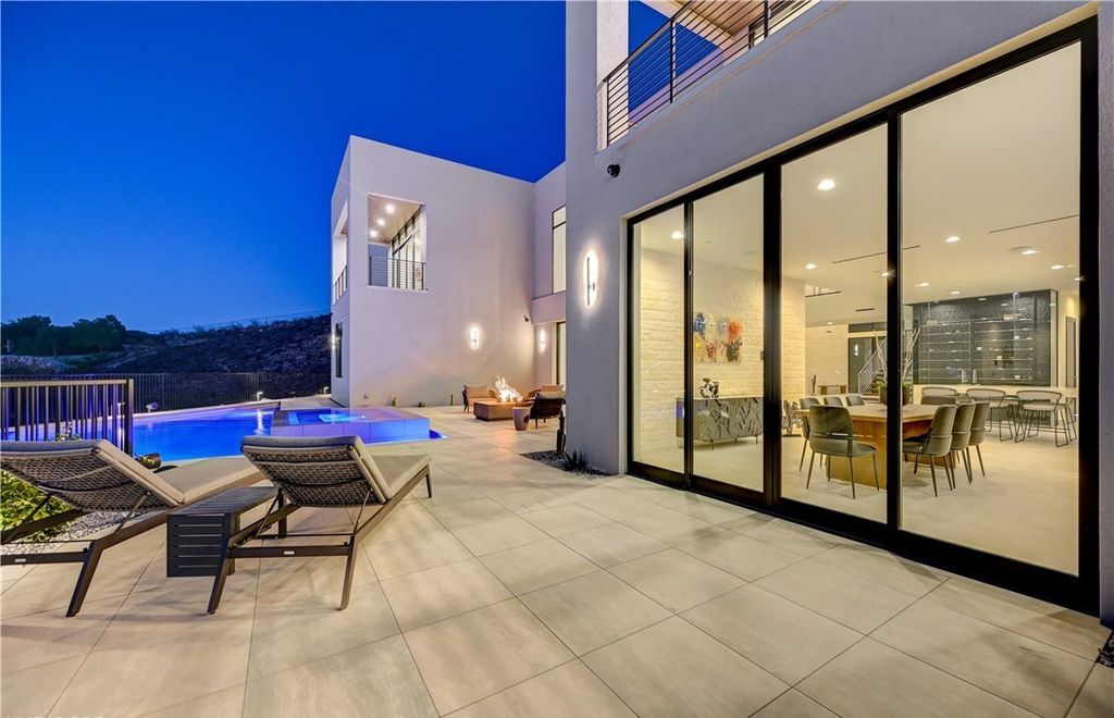 The Home in Henderson, a brand new construction features an open floor plan with modern finishes boasting unobstructed Vegas Strip and mountain views is now available for sale. This home located at 2281 Laughing Water Way, Henderson, Nevada