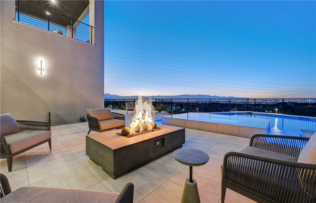 The Home in Henderson, a brand new construction features an open floor plan with modern finishes boasting unobstructed Vegas Strip and mountain views is now available for sale. This home located at 2281 Laughing Water Way, Henderson, Nevada