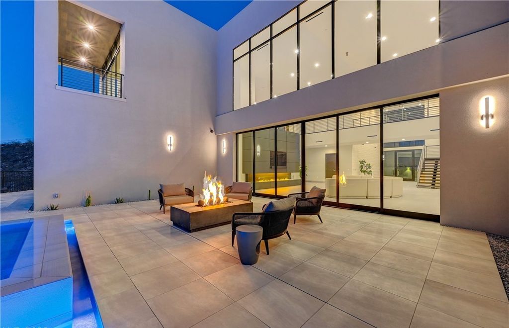 The Home in Henderson, a brand new construction features an open floor plan with modern finishes boasting unobstructed Vegas Strip and mountain views is now available for sale. This home located at 2281 Laughing Water Way, Henderson, Nevada
