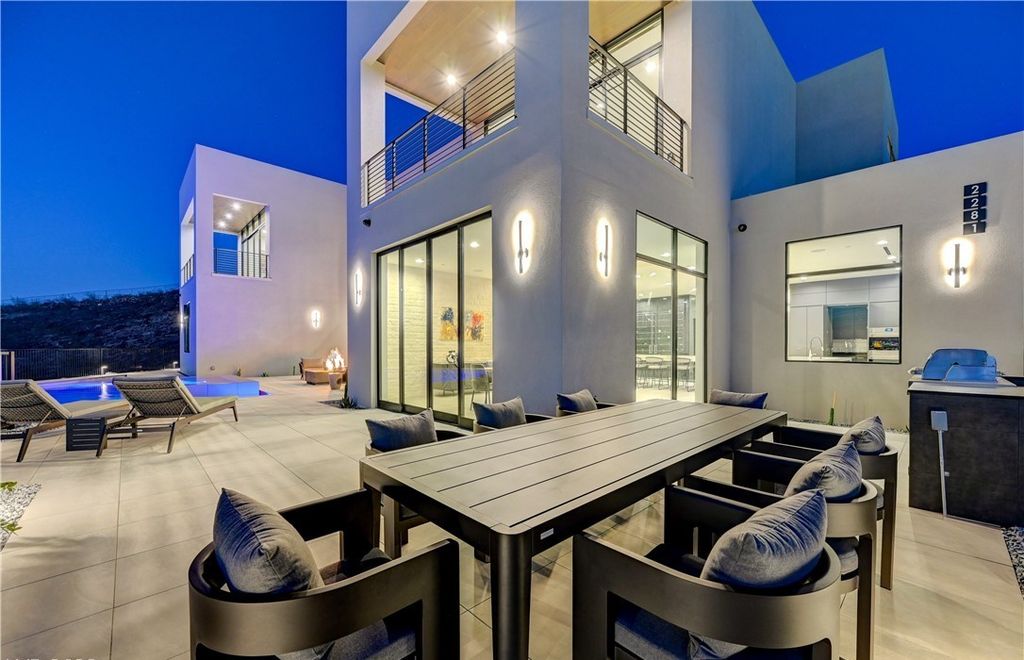 The Home in Henderson, a brand new construction features an open floor plan with modern finishes boasting unobstructed Vegas Strip and mountain views is now available for sale. This home located at 2281 Laughing Water Way, Henderson, Nevada