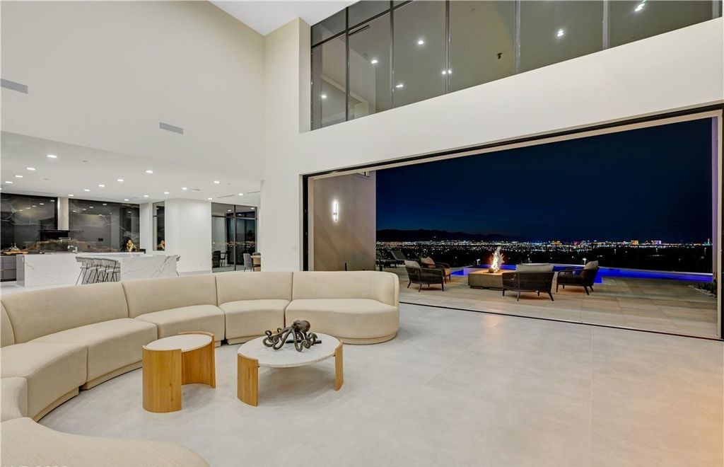 The Home in Henderson, a brand new construction features an open floor plan with modern finishes boasting unobstructed Vegas Strip and mountain views is now available for sale. This home located at 2281 Laughing Water Way, Henderson, Nevada