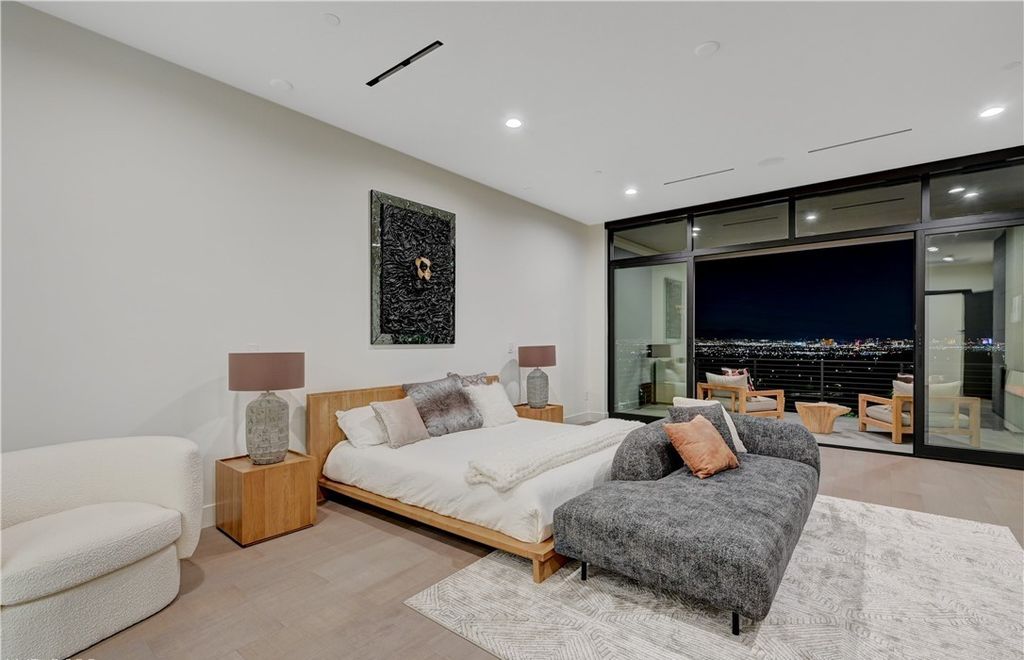 The Home in Henderson, a brand new construction features an open floor plan with modern finishes boasting unobstructed Vegas Strip and mountain views is now available for sale. This home located at 2281 Laughing Water Way, Henderson, Nevada