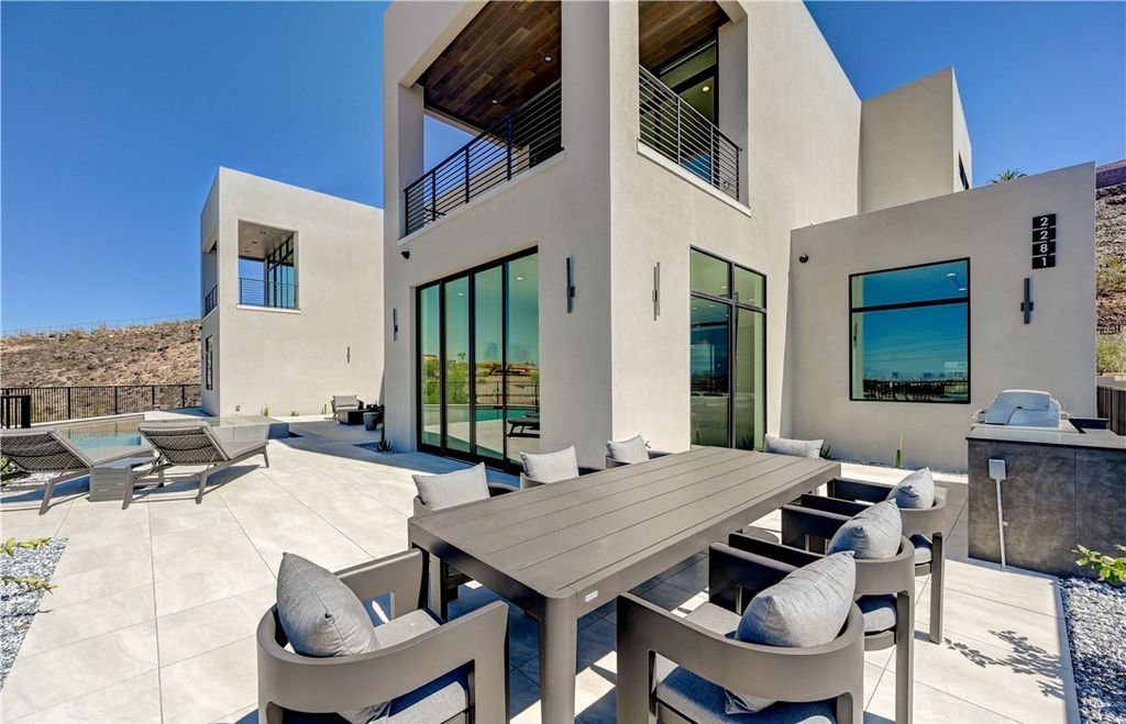 The Home in Henderson, a brand new construction features an open floor plan with modern finishes boasting unobstructed Vegas Strip and mountain views is now available for sale. This home located at 2281 Laughing Water Way, Henderson, Nevada