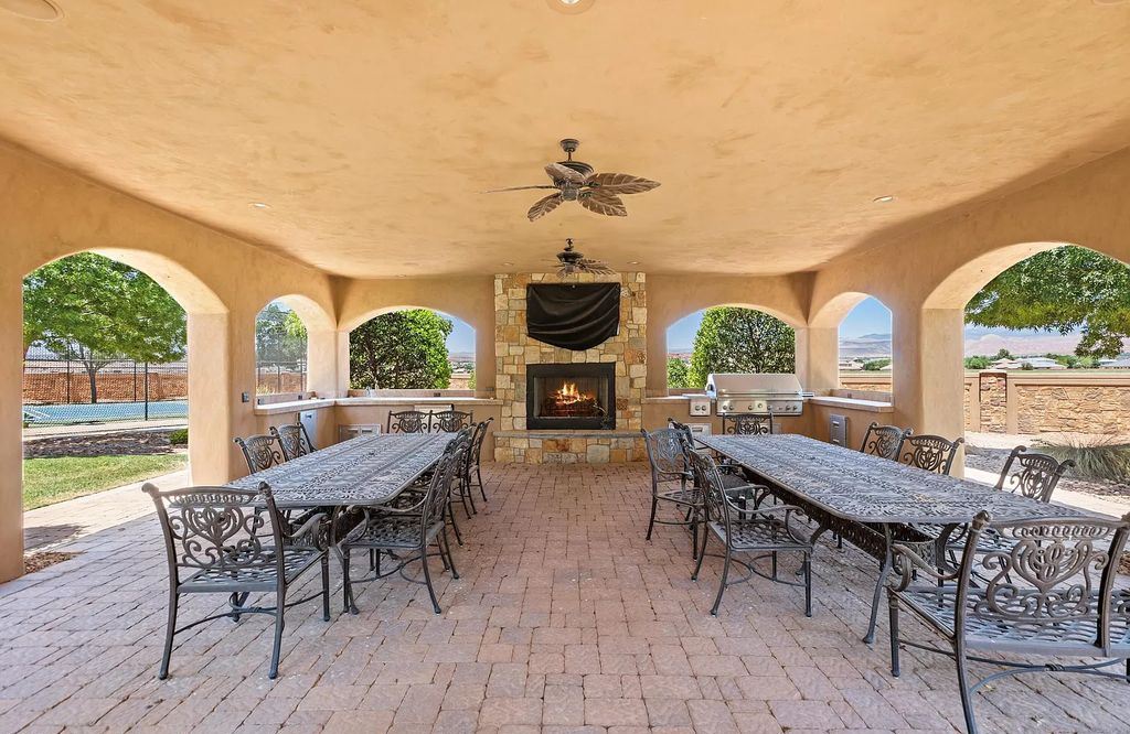 The Estate in Washington, a luxurious home with over 0.5 acre pond plenty of space for parking offering resort style pool, full sports court, theatre room, indoor gym, full bar, pavillion & indoor basketball court and  is now available for sale. This home located at 90 W Triple Crown Ln, Washington, Utah