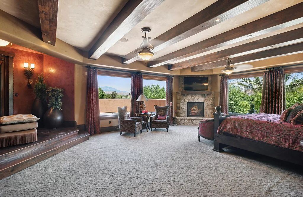 The Estate in Washington, a luxurious home with over 0.5 acre pond plenty of space for parking offering resort style pool, full sports court, theatre room, indoor gym, full bar, pavillion & indoor basketball court and  is now available for sale. This home located at 90 W Triple Crown Ln, Washington, Utah
