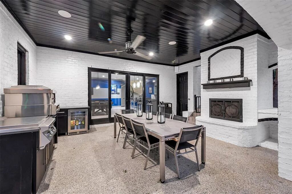 The Home in Frisco, an extraordinary modified Tudor style custom estate offers multiple spaces for entertaining and luxury amenities including onsite splash pad, pool and spa, two story terrace with balcony, theater room, game room, wine cellar and more is now available for sale. This home located at 6267 Sweeney Trl, Frisco, Texas
