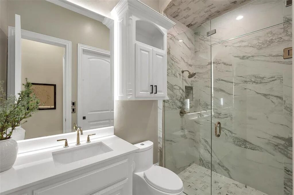 The Home in Frisco, an extraordinary modified Tudor style custom estate offers multiple spaces for entertaining and luxury amenities including onsite splash pad, pool and spa, two story terrace with balcony, theater room, game room, wine cellar and more is now available for sale. This home located at 6267 Sweeney Trl, Frisco, Texas