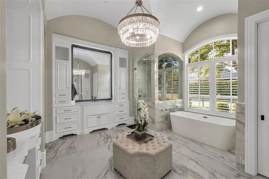 The Home in Frisco, an extraordinary modified Tudor style custom estate offers multiple spaces for entertaining and luxury amenities including onsite splash pad, pool and spa, two story terrace with balcony, theater room, game room, wine cellar and more is now available for sale. This home located at 6267 Sweeney Trl, Frisco, Texas