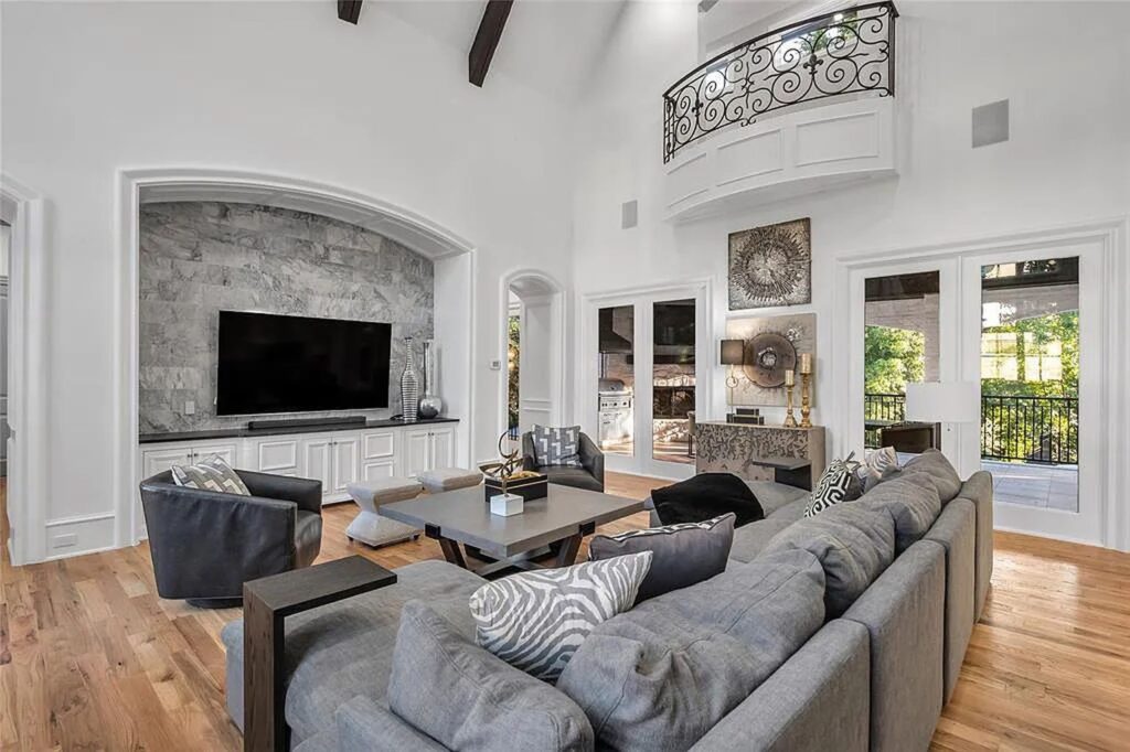 The Home in Frisco, an extraordinary modified Tudor style custom estate offers multiple spaces for entertaining and luxury amenities including onsite splash pad, pool and spa, two story terrace with balcony, theater room, game room, wine cellar and more is now available for sale. This home located at 6267 Sweeney Trl, Frisco, Texas
