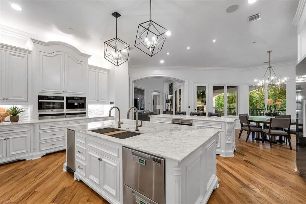 The Home in Frisco, an extraordinary modified Tudor style custom estate offers multiple spaces for entertaining and luxury amenities including onsite splash pad, pool and spa, two story terrace with balcony, theater room, game room, wine cellar and more is now available for sale. This home located at 6267 Sweeney Trl, Frisco, Texas