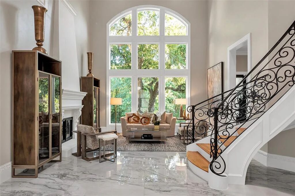 The Home in Frisco, an extraordinary modified Tudor style custom estate offers multiple spaces for entertaining and luxury amenities including onsite splash pad, pool and spa, two story terrace with balcony, theater room, game room, wine cellar and more is now available for sale. This home located at 6267 Sweeney Trl, Frisco, Texas