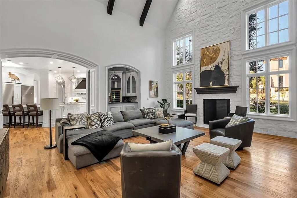 The Home in Frisco, an extraordinary modified Tudor style custom estate offers multiple spaces for entertaining and luxury amenities including onsite splash pad, pool and spa, two story terrace with balcony, theater room, game room, wine cellar and more is now available for sale. This home located at 6267 Sweeney Trl, Frisco, Texas
