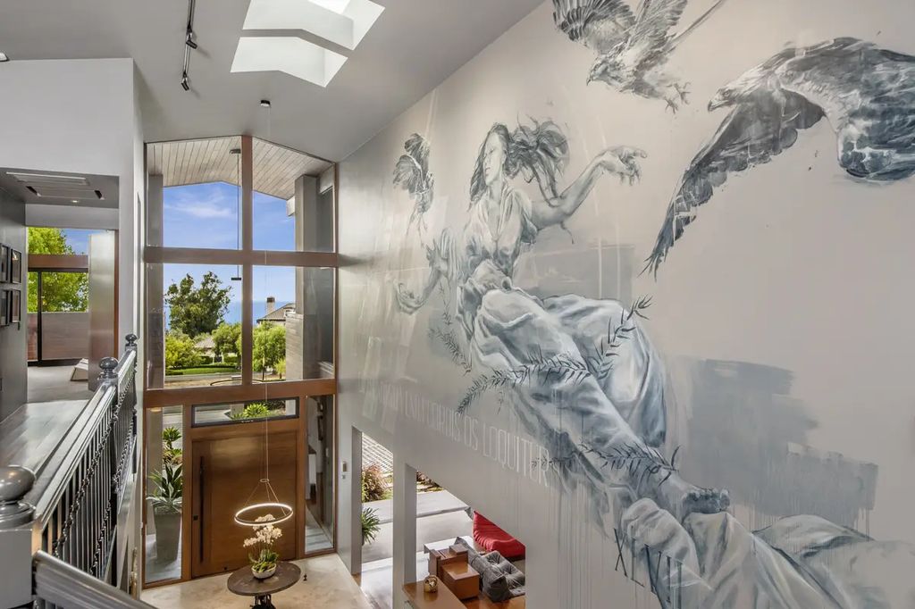 The Home in Palos Verdes Estate, an extraordinary custom estate with an expansive eco-friendly motor court and uniquely designed accents offering spectacular views of Santa Monica bay is now available for sale. This home located at 1328 Palos Verdes Dr W, Palos Verdes Peninsula, California offers 7 bedrooms and 8 bathrooms with over 8,000 square feet of living spaces.
