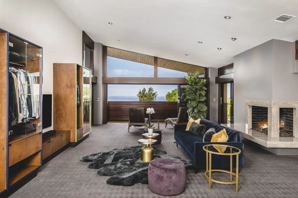 The Home in Palos Verdes Estate, an extraordinary custom estate with an expansive eco-friendly motor court and uniquely designed accents offering spectacular views of Santa Monica bay is now available for sale. This home located at 1328 Palos Verdes Dr W, Palos Verdes Peninsula, California offers 7 bedrooms and 8 bathrooms with over 8,000 square feet of living spaces.