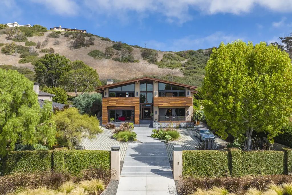 The Home in Palos Verdes Estate, an extraordinary custom estate with an expansive eco-friendly motor court and uniquely designed accents offering spectacular views of Santa Monica bay is now available for sale. This home located at 1328 Palos Verdes Dr W, Palos Verdes Peninsula, California offers 7 bedrooms and 8 bathrooms with over 8,000 square feet of living spaces.