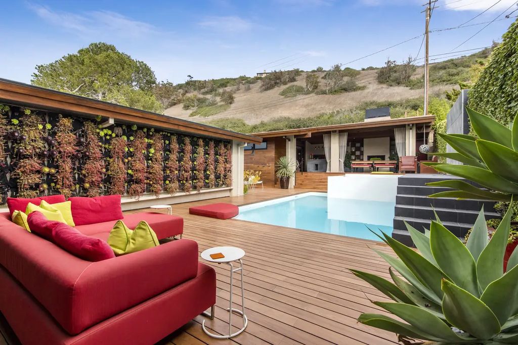 The Home in Palos Verdes Estate, an extraordinary custom estate with an expansive eco-friendly motor court and uniquely designed accents offering spectacular views of Santa Monica bay is now available for sale. This home located at 1328 Palos Verdes Dr W, Palos Verdes Peninsula, California offers 7 bedrooms and 8 bathrooms with over 8,000 square feet of living spaces.