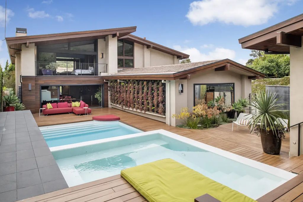The Home in Palos Verdes Estate, an extraordinary custom estate with an expansive eco-friendly motor court and uniquely designed accents offering spectacular views of Santa Monica bay is now available for sale. This home located at 1328 Palos Verdes Dr W, Palos Verdes Peninsula, California offers 7 bedrooms and 8 bathrooms with over 8,000 square feet of living spaces.