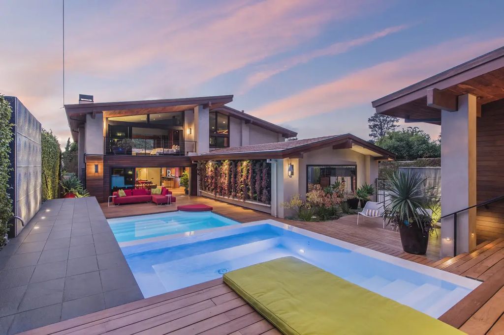 The Home in Palos Verdes Estate, an extraordinary custom estate with an expansive eco-friendly motor court and uniquely designed accents offering spectacular views of Santa Monica bay is now available for sale. This home located at 1328 Palos Verdes Dr W, Palos Verdes Peninsula, California offers 7 bedrooms and 8 bathrooms with over 8,000 square feet of living spaces.