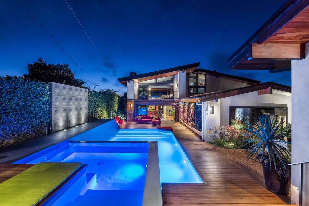 The Home in Palos Verdes Estate, an extraordinary custom estate with an expansive eco-friendly motor court and uniquely designed accents offering spectacular views of Santa Monica bay is now available for sale. This home located at 1328 Palos Verdes Dr W, Palos Verdes Peninsula, California offers 7 bedrooms and 8 bathrooms with over 8,000 square feet of living spaces.