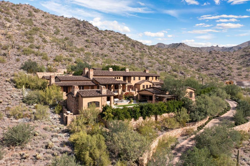 The Estate in Scottsdale, a mountainside sanctuary that offers both privacy and an organic connection to the Sonoran Desert built with the highest quality materials and workmanship is now available for sale. This home located at 10738 E Diamond Rim Dr, Scottsdale, Arizona