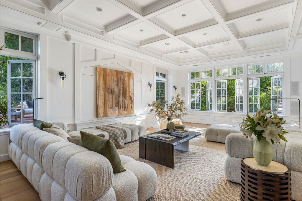 The Estate in Pacific Palisades, a newly renovated home on a double lot comprised of nearly 1.4 acres with park-like grounds that include an incredible pool and spa, cabana, guest house, expansive yard and tennis court is now available for sale. This home located at 1575 Capri Dr, Pacific Palisades, California