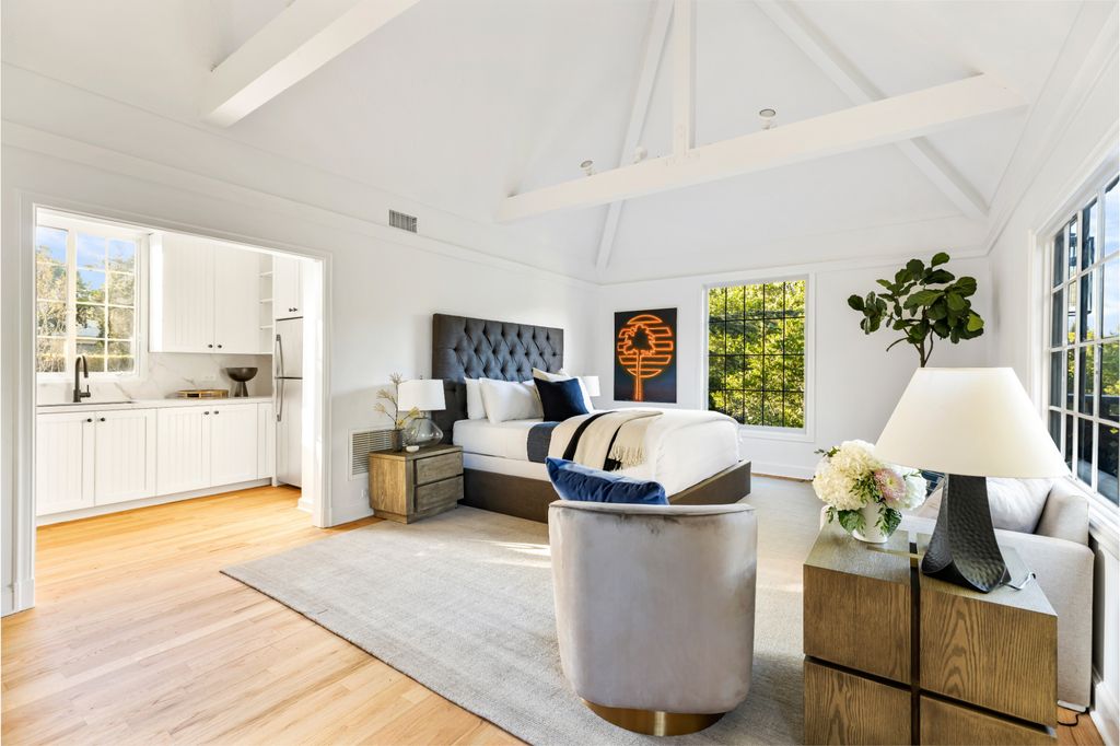 The Estate in Pacific Palisades, a newly renovated home on a double lot comprised of nearly 1.4 acres with park-like grounds that include an incredible pool and spa, cabana, guest house, expansive yard and tennis court is now available for sale. This home located at 1575 Capri Dr, Pacific Palisades, California