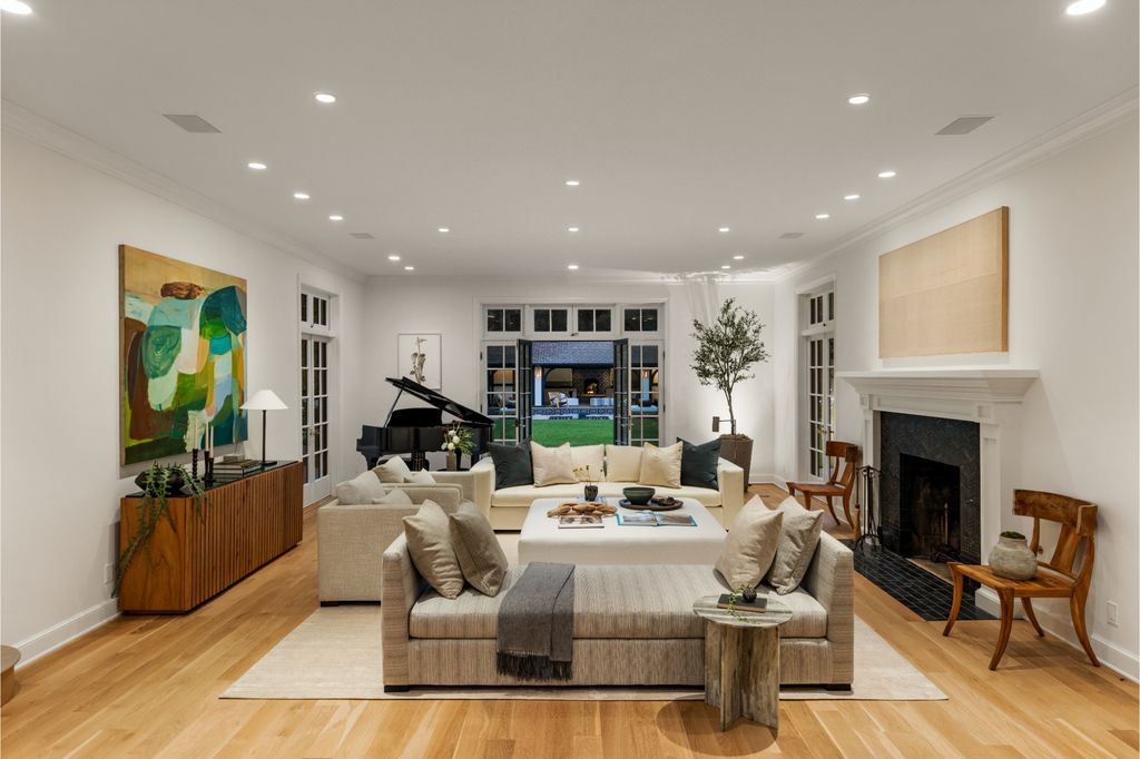 The Estate in Pacific Palisades, a newly renovated home on a double lot comprised of nearly 1.4 acres with park-like grounds that include an incredible pool and spa, cabana, guest house, expansive yard and tennis court is now available for sale. This home located at 1575 Capri Dr, Pacific Palisades, California