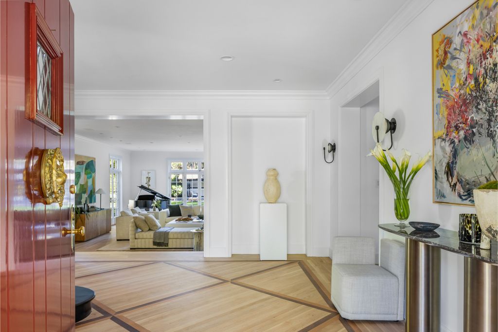 The Estate in Pacific Palisades, a newly renovated home on a double lot comprised of nearly 1.4 acres with park-like grounds that include an incredible pool and spa, cabana, guest house, expansive yard and tennis court is now available for sale. This home located at 1575 Capri Dr, Pacific Palisades, California