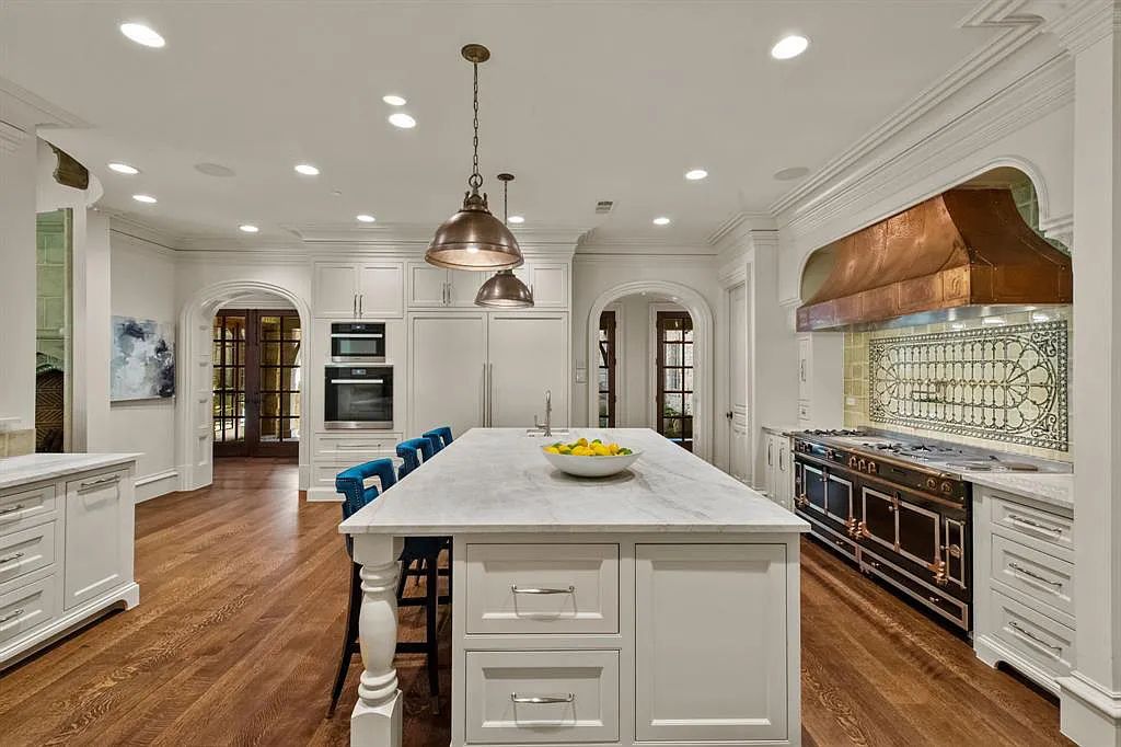 The Home in Westlake, a beautifully appointed Paul Kramer home boasts both impressive architectural and designer details including a dramatic mahogany rotunda, meticulous gardens, lovely sculptures, elegant circular breakfast nook and multiple outdoor areas perfect for entertaining is now available for sale. This home located at 2006 Navasota Cv, Westlake, Texas