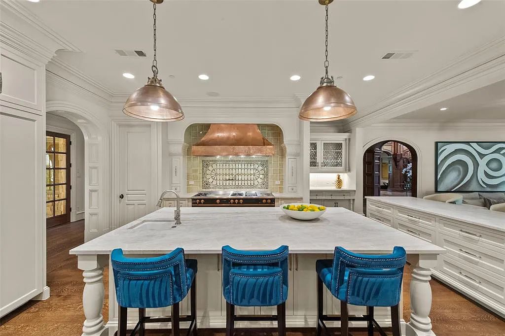 The Home in Westlake, a beautifully appointed Paul Kramer home boasts both impressive architectural and designer details including a dramatic mahogany rotunda, meticulous gardens, lovely sculptures, elegant circular breakfast nook and multiple outdoor areas perfect for entertaining is now available for sale. This home located at 2006 Navasota Cv, Westlake, Texas