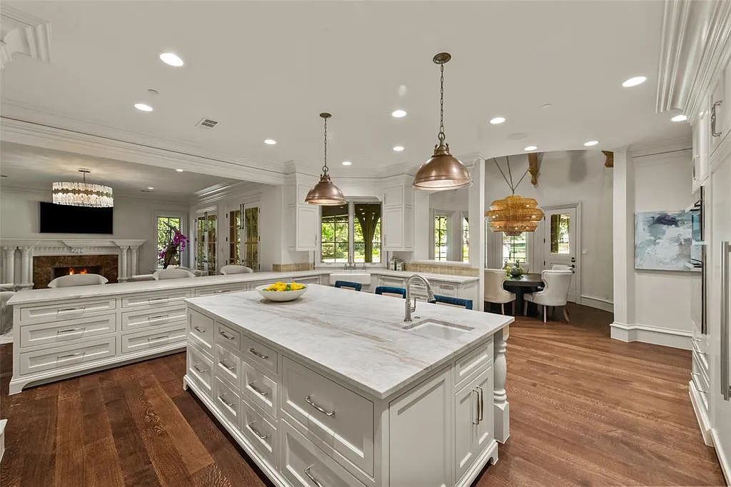 The Home in Westlake, a beautifully appointed Paul Kramer home boasts both impressive architectural and designer details including a dramatic mahogany rotunda, meticulous gardens, lovely sculptures, elegant circular breakfast nook and multiple outdoor areas perfect for entertaining is now available for sale. This home located at 2006 Navasota Cv, Westlake, Texas