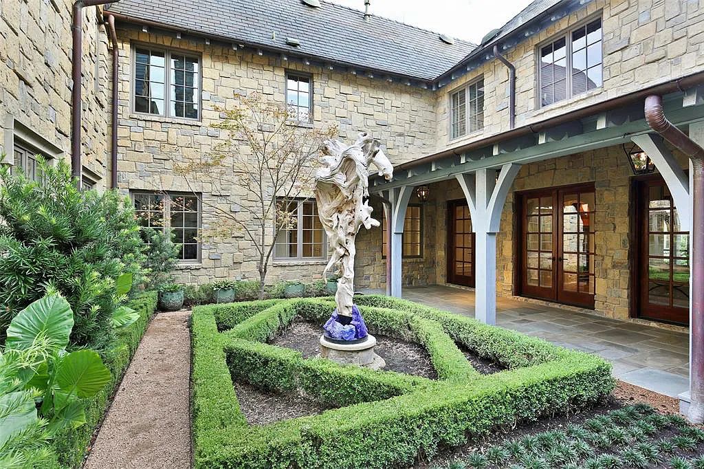 The Home in Westlake, a beautifully appointed Paul Kramer home boasts both impressive architectural and designer details including a dramatic mahogany rotunda, meticulous gardens, lovely sculptures, elegant circular breakfast nook and multiple outdoor areas perfect for entertaining is now available for sale. This home located at 2006 Navasota Cv, Westlake, Texas