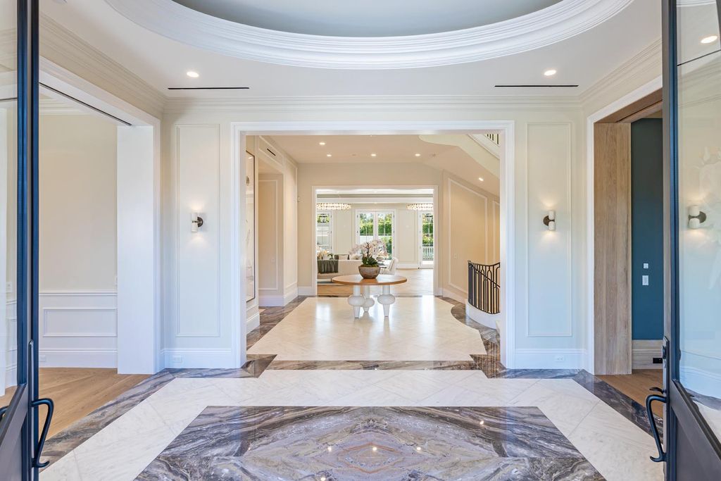 The Estate in Beverly Hills, a brand new architectural triumph combines classic opulence and the modern feel of today with its exquisite features and luxurious quality finishes is now available for sale. This home located at 802 Foothill Rd, Beverly Hills, California