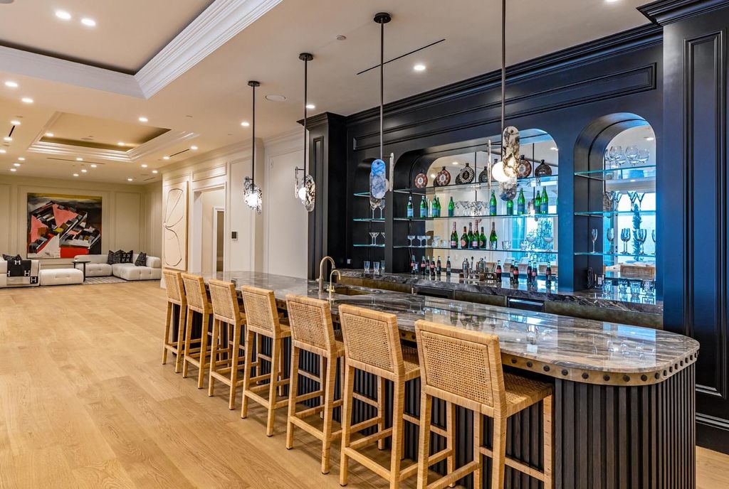 The Estate in Beverly Hills, a brand new architectural triumph combines classic opulence and the modern feel of today with its exquisite features and luxurious quality finishes is now available for sale. This home located at 802 Foothill Rd, Beverly Hills, California