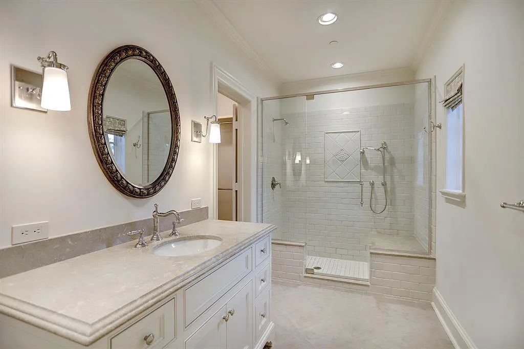 The Estate in Houston, a breathtaking home has loads of curb appeal with meticulously maintained grounds, elegant sconces, and stunning red brick, captivating backyard perfect for entertaining is now available for sale. This home located at 11320 Green Vale Dr, Houston, Texas