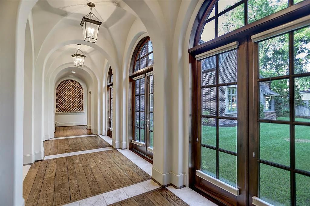 The Estate in Houston, a breathtaking home has loads of curb appeal with meticulously maintained grounds, elegant sconces, and stunning red brick, captivating backyard perfect for entertaining is now available for sale. This home located at 11320 Green Vale Dr, Houston, Texas