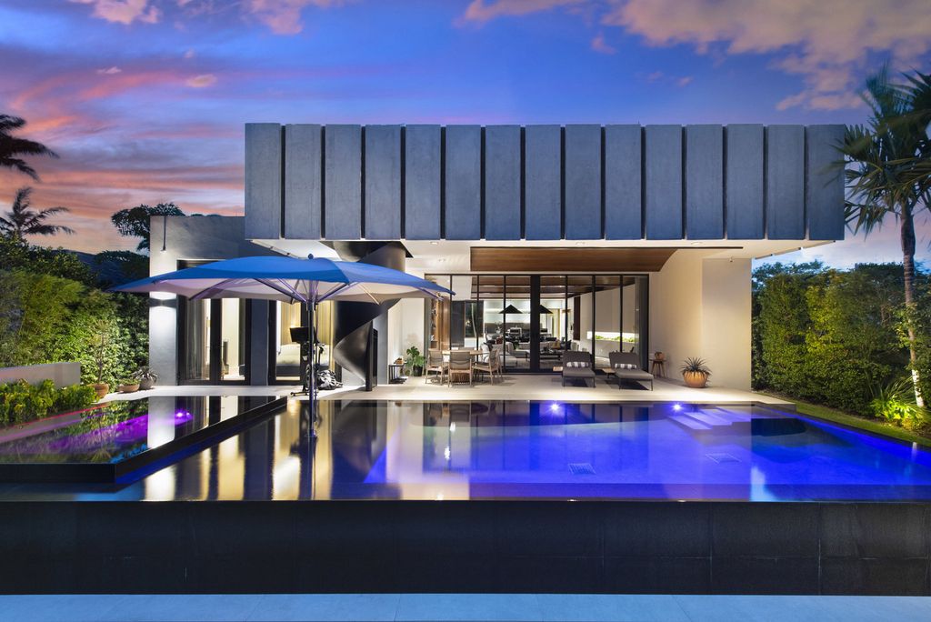 The Villa in Miami Beach, a custom exquisite waterfront home in the prestigious 24H guard gated community Biscayne Pointe offering 60 feet of waterfrontage with new dock is now available for sale. This home located at 8055 Noremac Ave, Miami Beach, Florida