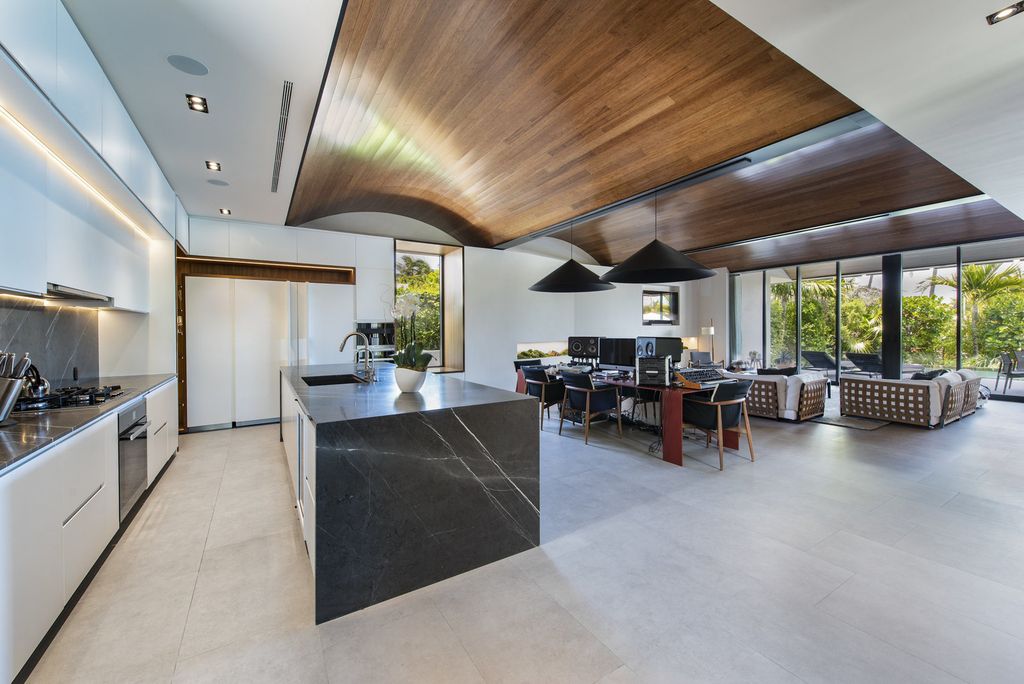 The Villa in Miami Beach, a custom exquisite waterfront home in the prestigious 24H guard gated community Biscayne Pointe offering 60 feet of waterfrontage with new dock is now available for sale. This home located at 8055 Noremac Ave, Miami Beach, Florida
