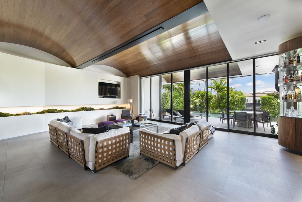 The Villa in Miami Beach, a custom exquisite waterfront home in the prestigious 24H guard gated community Biscayne Pointe offering 60 feet of waterfrontage with new dock is now available for sale. This home located at 8055 Noremac Ave, Miami Beach, Florida