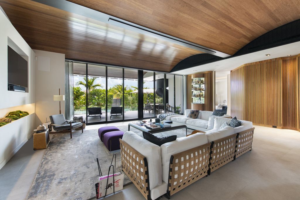 The Villa in Miami Beach, a custom exquisite waterfront home in the prestigious 24H guard gated community Biscayne Pointe offering 60 feet of waterfrontage with new dock is now available for sale. This home located at 8055 Noremac Ave, Miami Beach, Florida