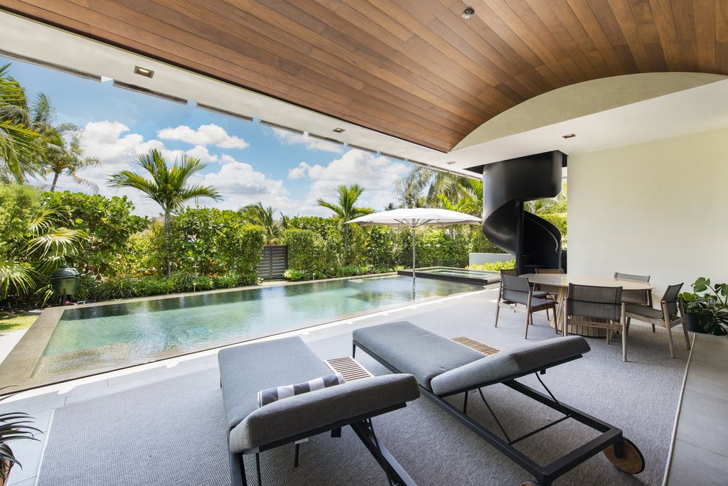 The Villa in Miami Beach, a custom exquisite waterfront home in the prestigious 24H guard gated community Biscayne Pointe offering 60 feet of waterfrontage with new dock is now available for sale. This home located at 8055 Noremac Ave, Miami Beach, Florida