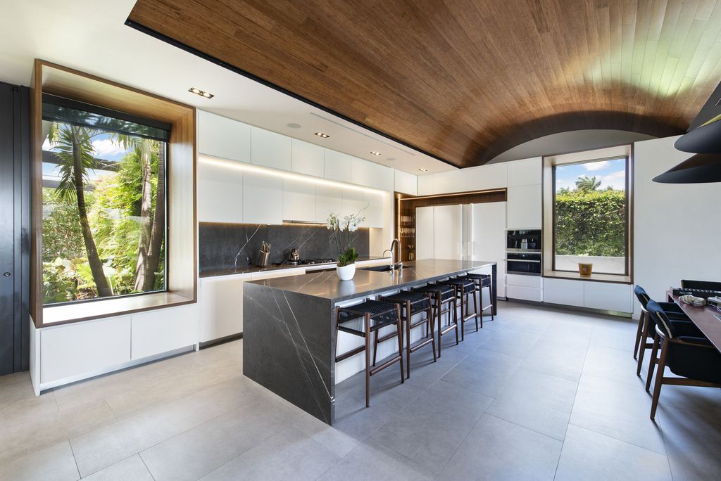 The Villa in Miami Beach, a custom exquisite waterfront home in the prestigious 24H guard gated community Biscayne Pointe offering 60 feet of waterfrontage with new dock is now available for sale. This home located at 8055 Noremac Ave, Miami Beach, Florida