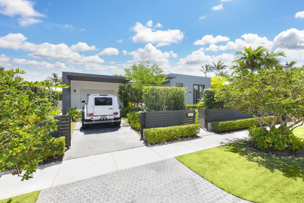 The Villa in Miami Beach, a custom exquisite waterfront home in the prestigious 24H guard gated community Biscayne Pointe offering 60 feet of waterfrontage with new dock is now available for sale. This home located at 8055 Noremac Ave, Miami Beach, Florida